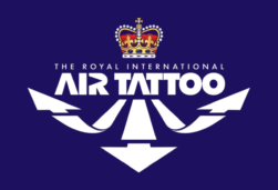 the royal international air tattoo logo on a dark blue background